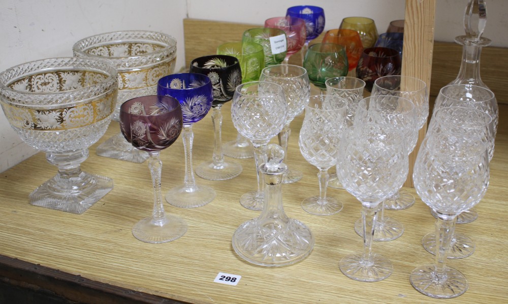 A set of six Royal Doulton cut glass goblets, 19cm, two pairs of goblets in a matching pattern, 18cm and 17cm, and a matching decanter,